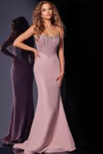 Model wearing D5310 blush mermaid gown, front view with detailed embellishments.