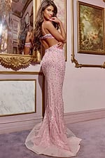 Back view of model wearing D5713 pink gown showcasing subtle back cut