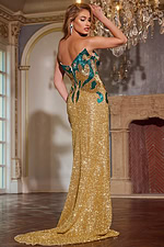 Model wearing Jovani D5723 nude sequin gown with elegant train from the back.