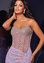 Model wearing Jovani D5742 pink gown showcasing intricate neckline details and fitted design.