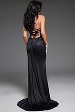 Model showing back view of Jovani D6025 black gown with open corset-style back