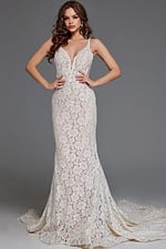 Model in Jovani JB03864 ivory dress, front view with lace detailing and mermaid silhouette.