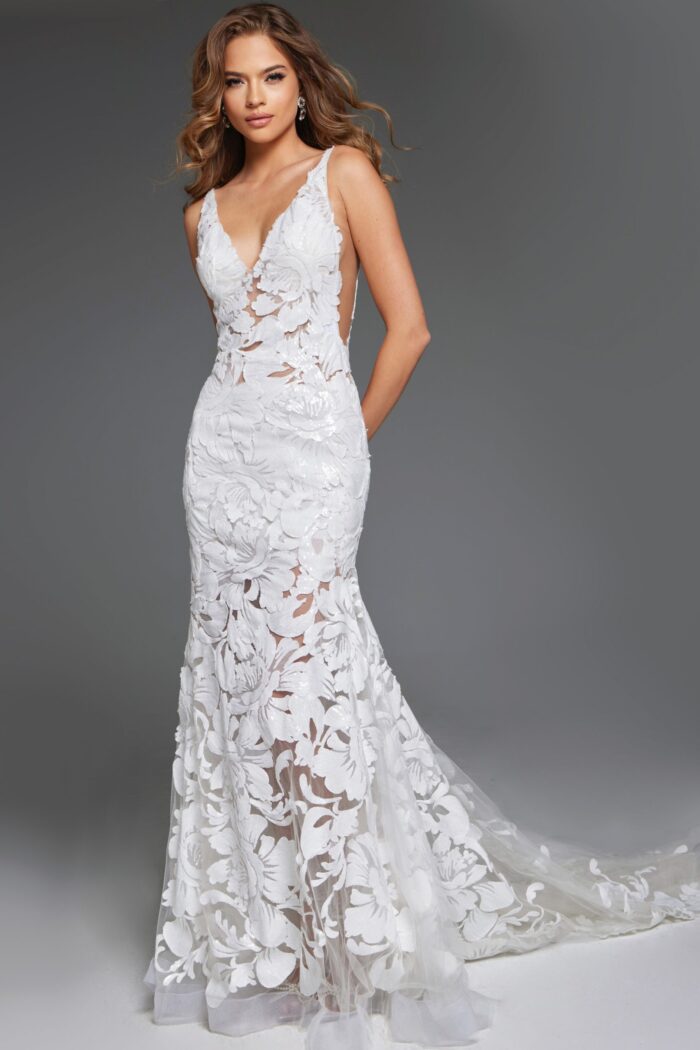 Model wearing Jovani JB04192 white gown in a studio setting