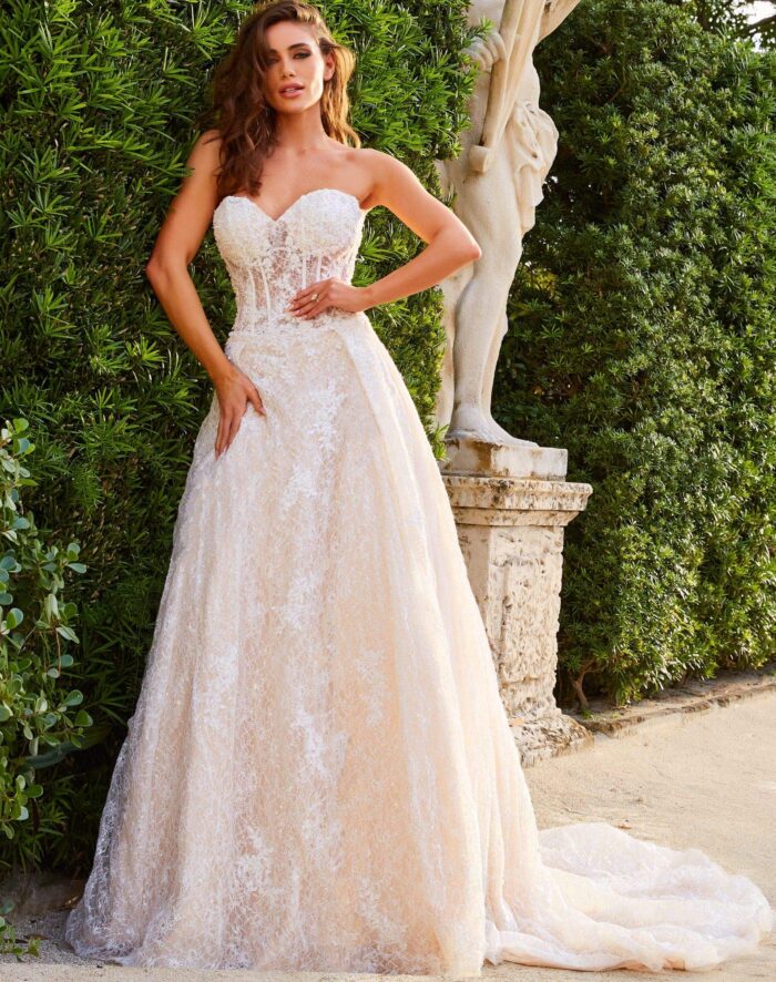 Model wearing Jovani JB05349 ivory gown, front view, with sweetheart neckline and lace details.