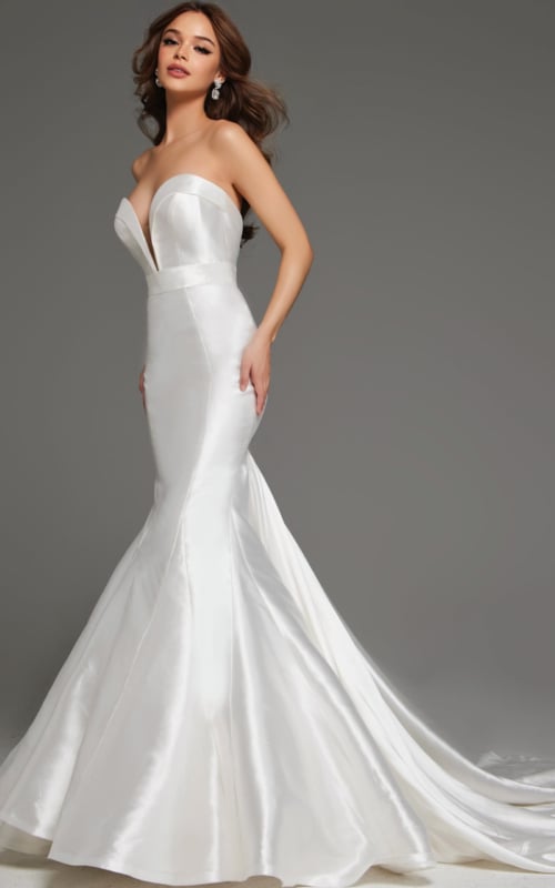 Model wearing JB05356 white mermaid dress, side view showcasing the flared skirt and strapless neckline.