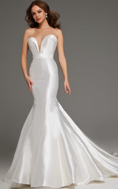 Model wearing JB05356 white mermaid dress, front view showing the strapless neckline and fitted silhouette.