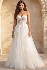 Strapless lace bodice gown with soft tulle A line skirt and floral appliqué details.