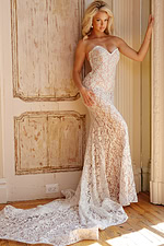 Model in front view of Jovani JB06588 Ivory dress, highlighting sweetheart neckline and lace train.