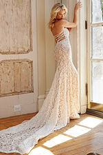 Back view of Jovani JB06588 Ivory gown, showcasing the exquisite lace and train.