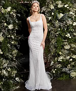 Model in Jovani JB06666 white dress showing elegant silhouette, front view