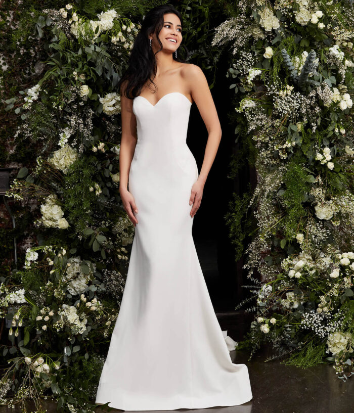 Front view of model wearing Jovani JB06912 ivory gown.