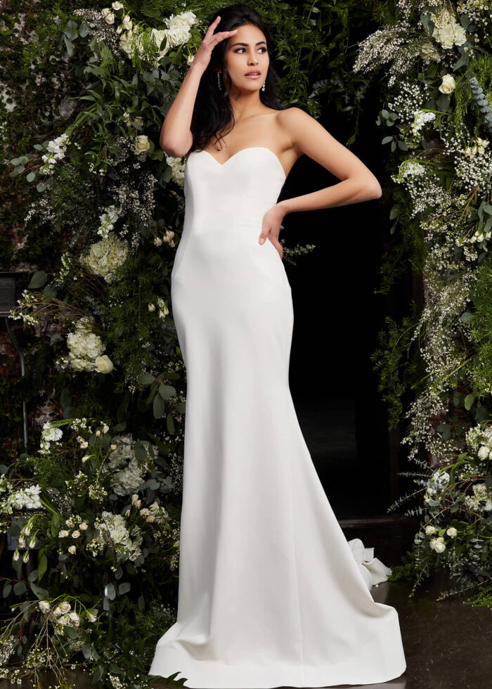 Jovani JB06912 ivory dress with sweetheart neckline, front view in floral setting.