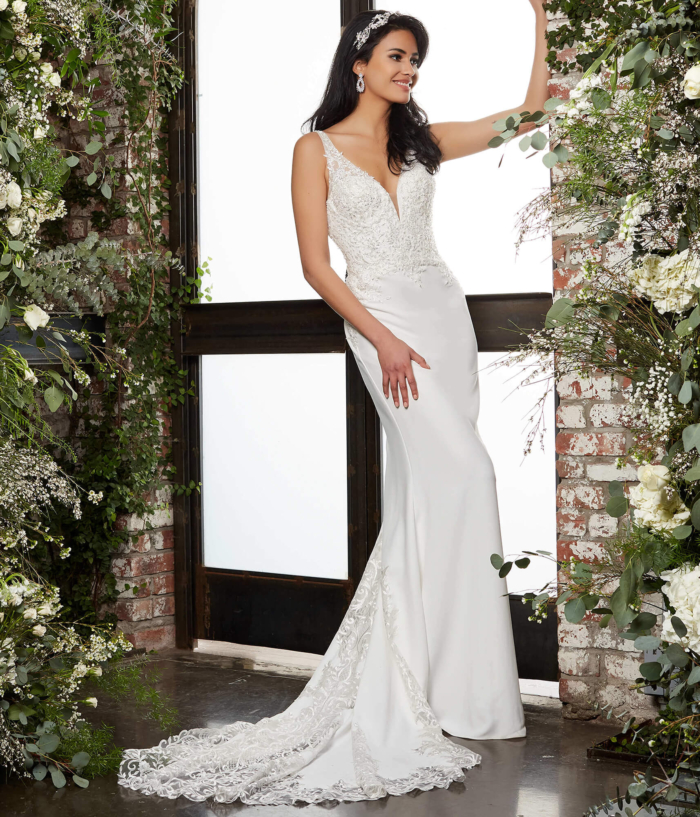 Front view of Jovani JB06928 showing deep V-neckline and intricate details.