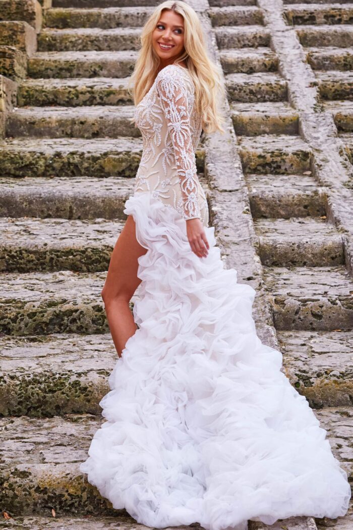 Model wearing Jovani JB07059 elegant gown with lace detailing and dramatic train, back view.