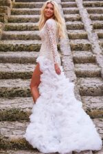 Model wearing Jovani JB07059 elegant gown with lace detailing and dramatic train, back view.