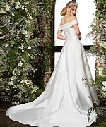 Back view of Jovani JB07134 ivory A-line gown showing covered buttons and elegant train.