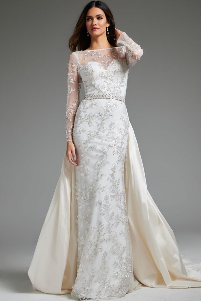 Model wearing Jovani JB07376 elegant white gown with illusion neckline and beaded embroidery.