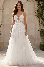 Lace A-line gown with deep V neckline, floral appliqués, and soft tulle skirt.