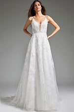 Model presenting Jovani JB07147 ivory dress with lace detailing.