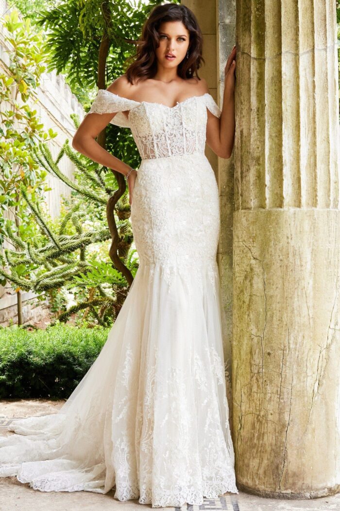 Model in front of Jovani JB07161 dress showcasing intricate lace