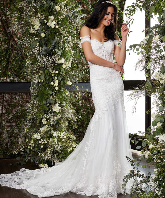 Model in Jovani JB07161 ivory dress featuring a sweetheart neckline