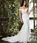 Model showcasing Jovani JB07161 in ivory with lace bodice