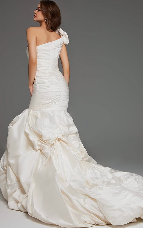 Model wearing Jovani 07179 white gown with one-shoulder neckline and mermaid silhouette, back view.