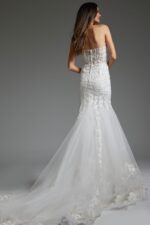 Back view of model wearing Jovani JB07260 white mermaid silhouette dress with lace details