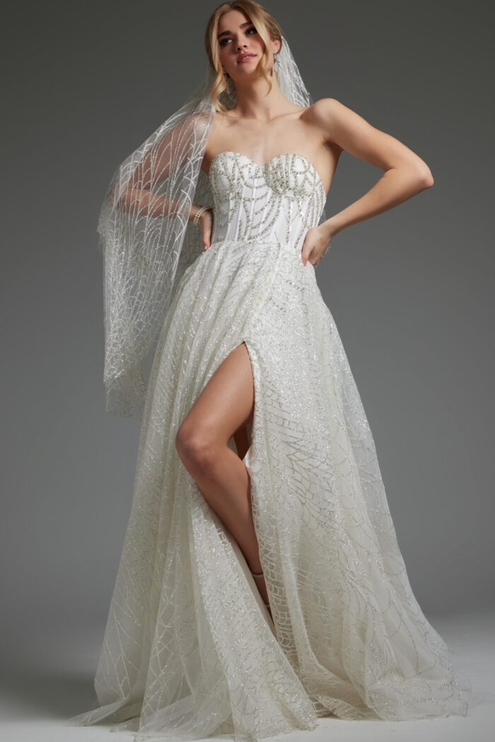 Model wearing JB07578 ivory gown featuring a strapless sweetheart neckline and high slit.