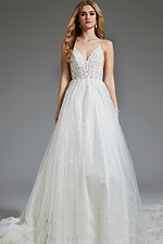 Model in Jovani JB07647 ivory gown, showcasing V-neckline and lace bodice.