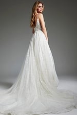 Model in Jovani JB07647 ivory dress, showcasing a graceful tulle skirt from the back.