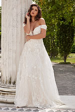 Model wearing Jovani JB220002 ivory dress front view with floral lace