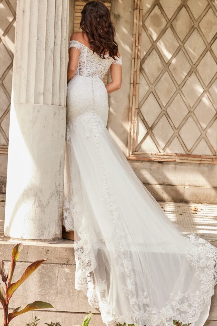 Back view of Jovani JB220003 ivory gown showing tulle train and lace accents.