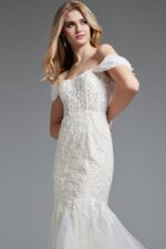 Close-up of Jovani JB220003 ivory gown showing lace details and off-the-shoulder neckline.