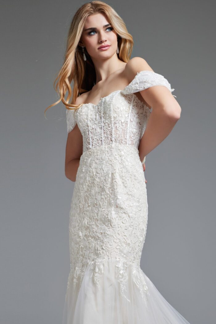 Close-up of Jovani JB220003 ivory gown showing lace details and off-the-shoulder neckline.