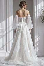 Romantic off-the-shoulder wedding gown with floral lace embroidery and semi-sheer structured bodice