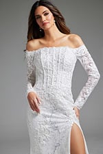 Model wearing Jovani JB23106 white gown, showing lace detail on sleeves and bodice.