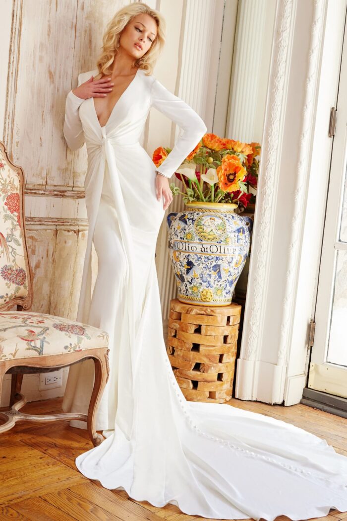 Front view of Jovani JB23181 white gown with long button-trimmed train