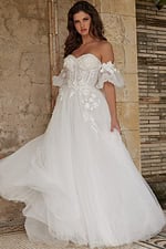 Model wearing Jovani JB23693 white gown with floral lace and puff sleeves, full-length front view.