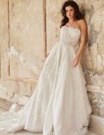 Jovani JB24563 wedding dress showing intricate lace details and elegant flow, front view.