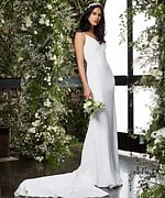 Model showcasing Jovani JB2507 ivory gown with gentle flair and V-neck