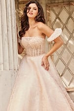 Model wearing JB26341 dress with a strapless neckline and lace detailing in nude color, front-facing.