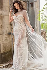 Model wearing Jovani JB23659 with a transparent sheer overlay and floral designs.