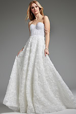 Model wearing Jovani JB36644 white gown with romantic rosette design.