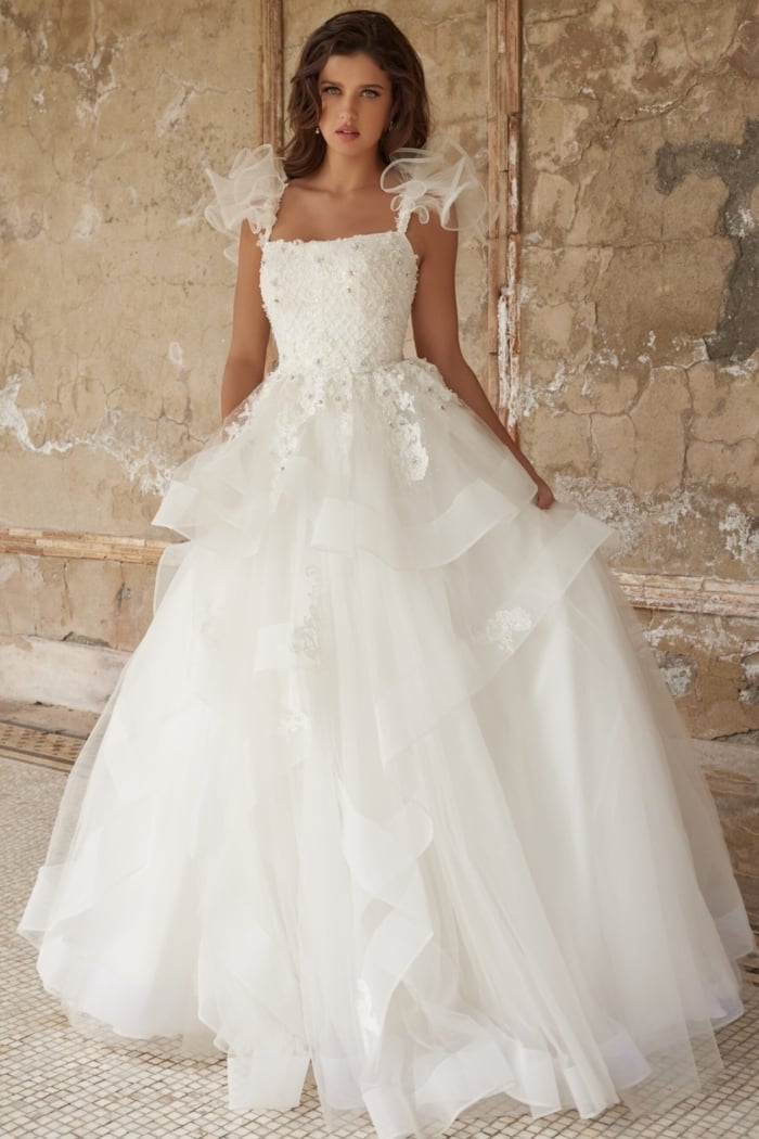 Flowing skirt of JB37575 white ball gown