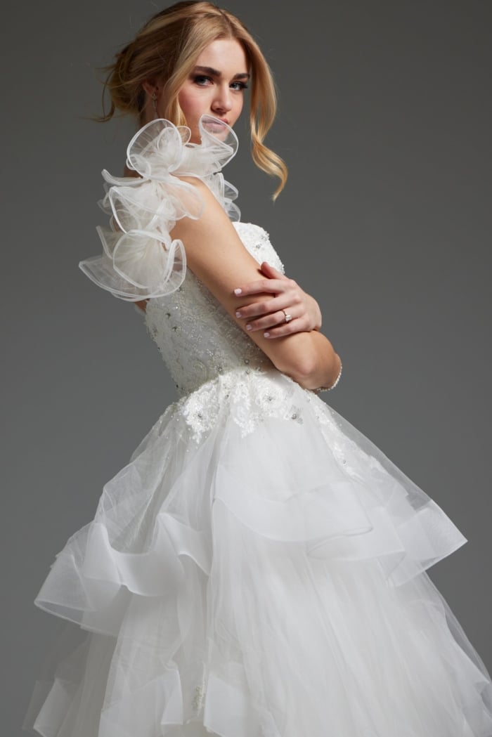 Side view of JB37575 white gown with ruffled sleeves