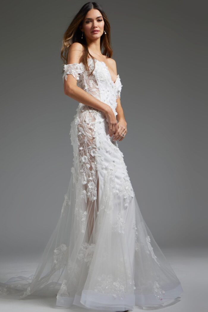 model wearing JB38224 white dress with floral appliqués and off-shoulder neckline, front view