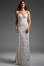 Model wearing Jovani JB38271 full-length front view of white lace dress