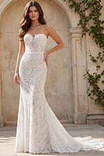 Strapless lace mermaid gown with floral pattern, sweetheart neckline, and fitted silhouette with a soft train.