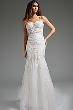 Model wearing Jovani JB38490, alternate front view, in white with floral lace.